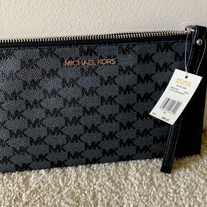 Brand new Michael Kors clutch